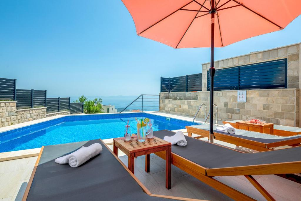 Doppelhaushälfte mit Aussicht - In Makarska